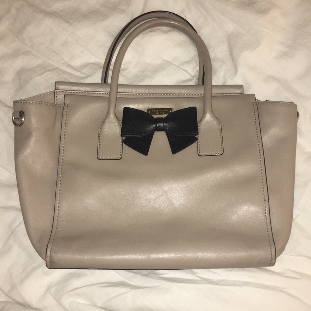Kate Spade tan handbag with black bow